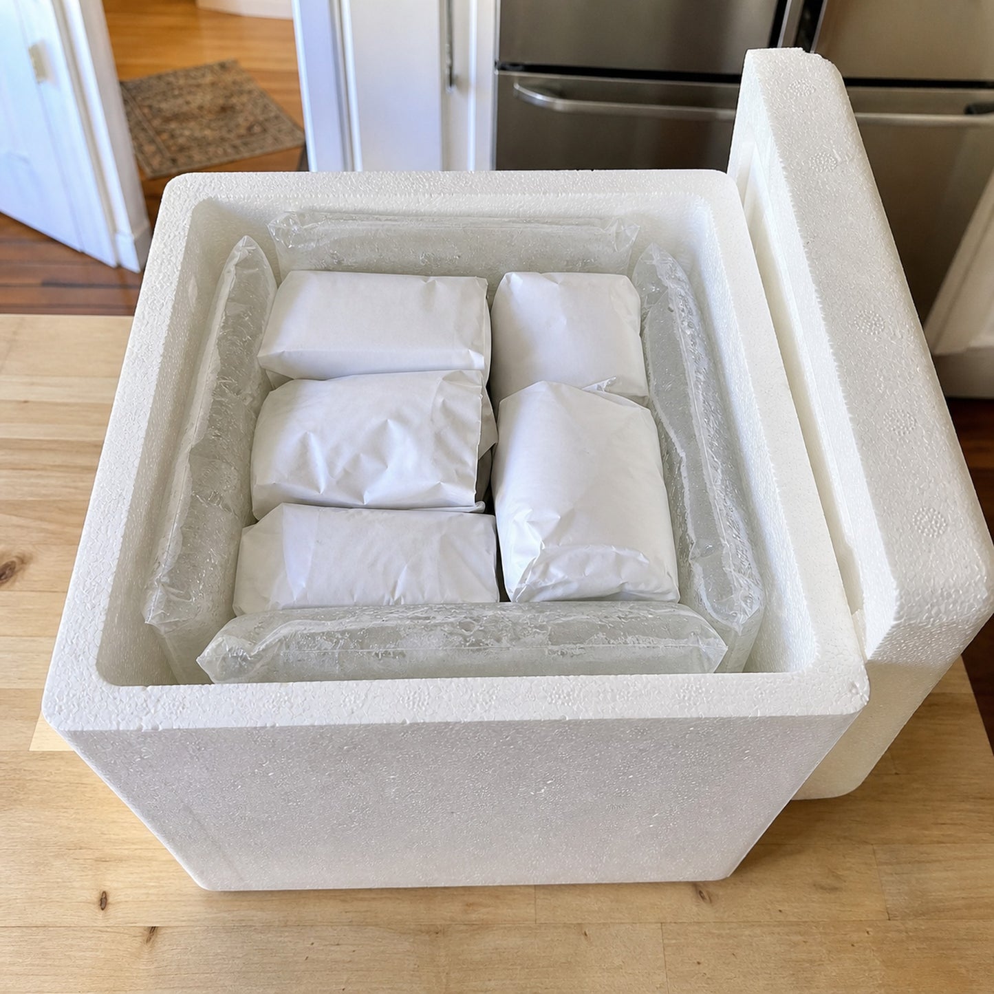 The Freezer Fill box packed full with frozen food and gel ice packs